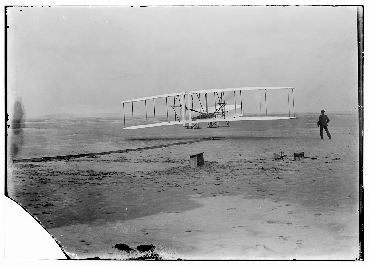 The first controlled, sustained powered flight